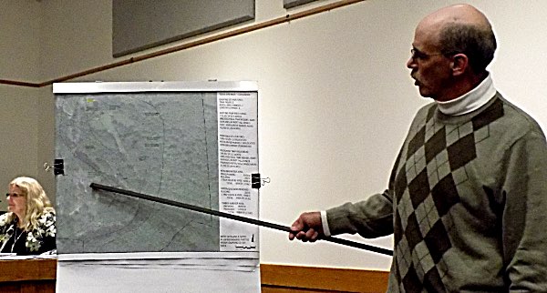 Lansing Code/Fire Enforcement Officer & Building Inspector Lynn Day explains the new plan for which he granted a building permit Wednesday. Lynn Day
