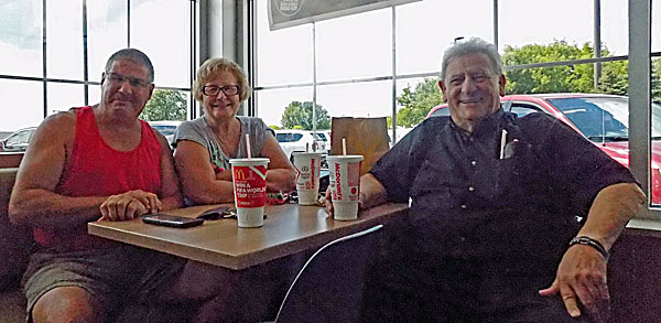 Regular customers Chuck Reed (left), Linda Drew, and Bill Drew were on hand for the re-opening festivities Lansing McDonalds