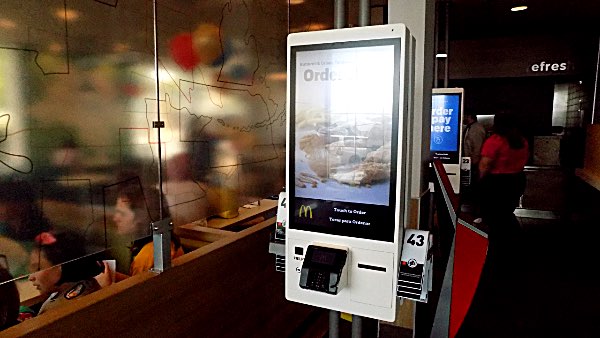 Large touch screens provide another way to order meals Lansing McDonalds