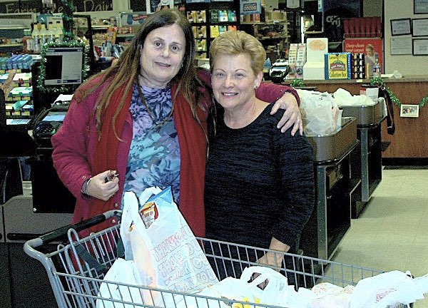 Kathryn Mapes (left) and Grocery Run Winner Debbie Ebemo rotary Kathryn Mapes and Debbie Ebemo