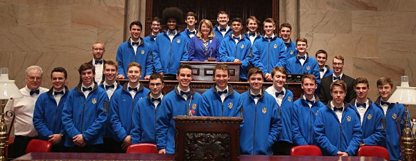 Senator Pam Helming stands with members of the Lansing High School Bobcats boys soccer team that won the 2017 New York State Public High School Athletic Association Championship, Head Coach Benji Parkes, and assistant coaches during a ceremony in the New York State Senate chamber on Tuesday, April 17. soccer albany