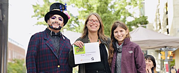 Zoe Dubrow (right) receives the Grand Prize in the 3rd Annual Ithaca Cupcake Baking Contest on October 13 from Debbie Lazinsky, representing contest sponsor GreenStar Natural Foods Market sophiefund ZoeDubrow
