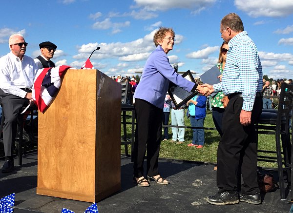 Doctor William Thibault and Tompkins County Legislature Chair Martha Robertson Tommy Come Home Historic Centennial Flight Ithaca-Tompkins Airport September 29, 2018