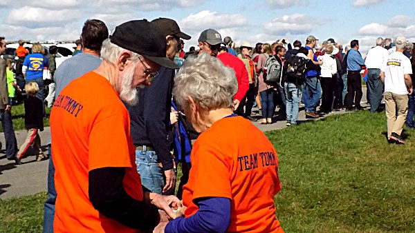Event organizers wore orange 'Tommy' T-shirts Tommy Come Home Historic Centennial Flight Ithaca-Tompkins Airport September 29, 2018