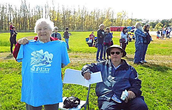 Louise Bement modeling a 'Tommy' T-shirt at the historic centennial flight of the Thomas Morse Scout last October. Louise Bement