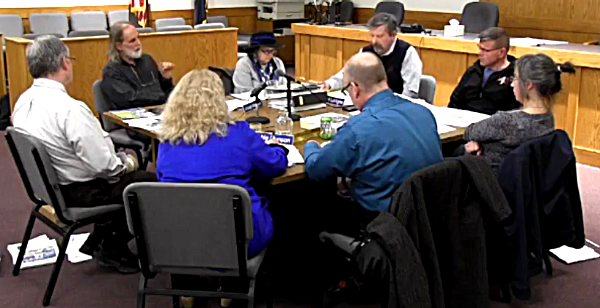 Counter-clockwise from front/center: Town Clerk Debbie Munson, Town Attorney Guy Krogh, Councilwoman Katrina Binkewicz, Councilman Doug Dake, Supervisor Ed LaVigne, Councilwoman Andra Benson, Councilman Joe Wetmore, Planning Consultant Michael Long Lansing Town Board