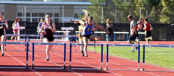 Hana Thibault winning 400m hurdles. Photo courtesy of Tracey Austin trackandfield trackandfield Hana Thibault winning 400m hurdles