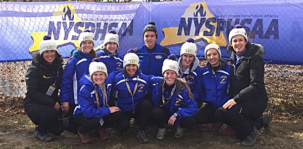 Back row: Coach Becca Lovenheim, Eden Jackson, Allison Keefe, Jack Thomas, Catie Eisenhut, Teresa Garcia, Coach Christine Eisenhut Front row: Kinsley Jacobs, Hana Thibault, Emmy Jackson xc states2018