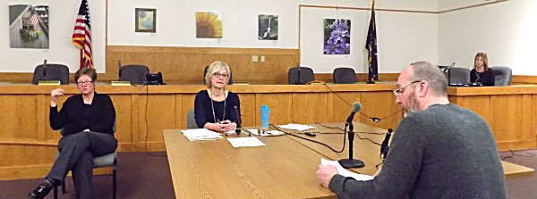Bill Kennedy Smith (right) reads a statement as DOT representive Kathleen Joy (at end of table) moderates Wednesday's public hearing Bill Kennedy Smith at DOT public hearing