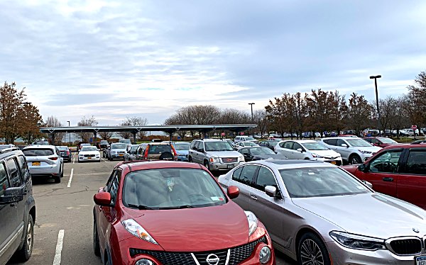 There is plenty of room in the long and short term airport parking lots for more solar-panel-covered parking shelters (in the distance in this picture) such as the one that was constructed as part of the airport expansion project. Airport Manager Mike Hall says the wiring is in place in the existing one for future automobile recharging stations, and will be included in future ones as they are funded and built. Solar Panels on Airport Parking Shelters