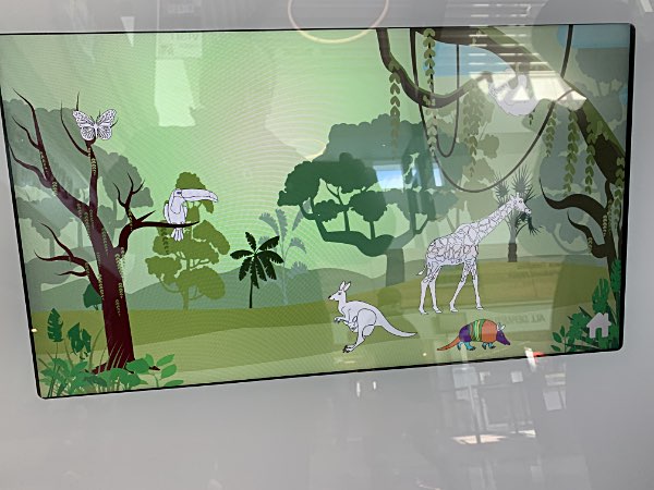 Three giant touch screens let children (and grownups) color the animals in a scene. Ithaca-Tompkins International Airport