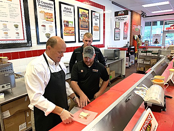 Congressman Tom Reed made a Smokehouse Beef & Cheddar Brisket Sub for himself, and a Hook & Ladder (turkey, ham, and cheese sub for Reed staffer Molly Safreed. Congressman Tom Reed
