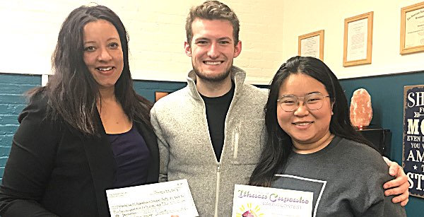 Josephine Gibson, executive director of the Mental Health Association in Tompkins County; Matthew Jirsa, former president of Cornell Minds Matter; and Winnie Ho, former president of Alpha Phi Omega Gamma Chapter sophiefund cupcakes