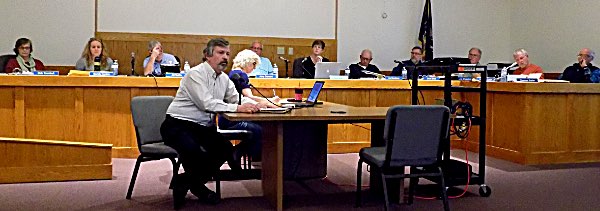 Town Supervisor Ed LaVigne (front) lays out a three-point plan to make communicating between boards and the public more effective. Town Communication