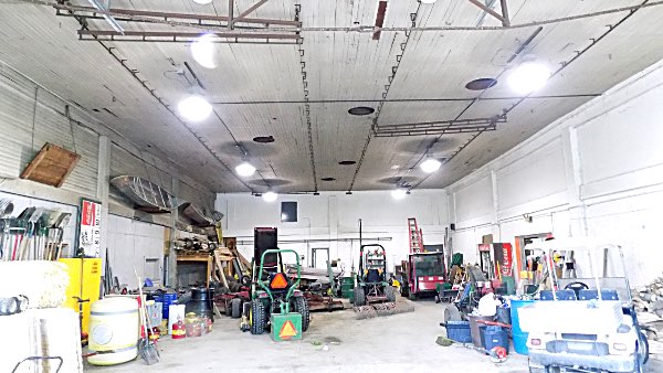 The film stage is used by the City of Ithaca Department of Public Works. Original tracks that were used for hanging scenery hang from the ceiling, that has holes cut into it that may have been used for lighting. Wharton film stage