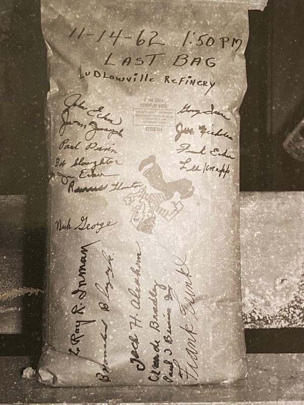 Last bag of salt prepared at Salt Point, signed by various workers. Photo provided by Gus Isaac TableSalt Rieger 3