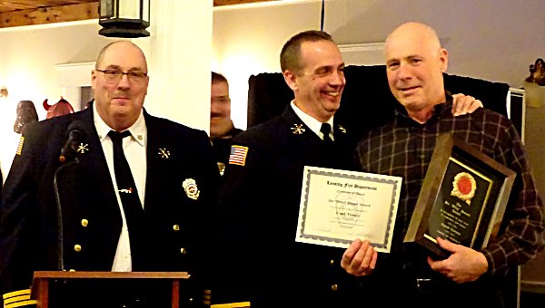 Frank Towner (right) received the Joe 'Ditty' Joseph Award from Assistant Chiefs Dennis Griffin (left) and Todd Mix Frank Towner