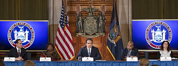 Governor Andrew M. Cuomo signs coronavirus legislation during a ceremony in the Red Room at the State Capitol. (Mike Groll/Office of Governor Andrew M. Cuomo) Cuomo Signs Coronavirus Bill