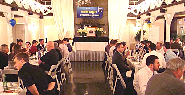The induction banquet has changed quite a bit since moving to the Lake Watch Inn. Before the move the ceremony tok place at the high school gym between varsity and junior varsity basketball games, with a small reception room nearby. Now it is a formal dinner that stands on its own. Lansing Athletics Hall Of Fame