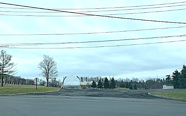 The mall owners are hoping to build an extended stay hotel on this lot, which is directly behind the Clarion Inn (seen at left) on North Triphammer Road. In 2017 Farrall told Village officials the new hotel would not be direct competition for the Clarion because it will serve a different market of people who need a temporary residence, rather than just a few nights' stay. Hotel