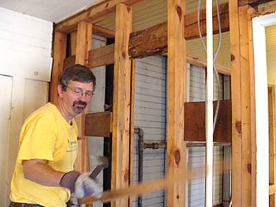 Town Councilman Ed LaVigne doing demolition work on a bathroom tcc_ed_bathroom